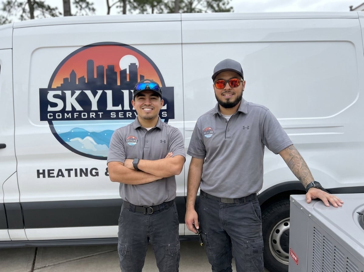 Skyline Comfort Services owners and technicians in Raleigh, NC, with company van and air conditioning unit.